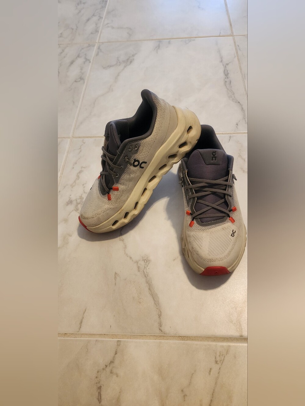 On Running Women's Athletic Shoes in Gray and Red Accents